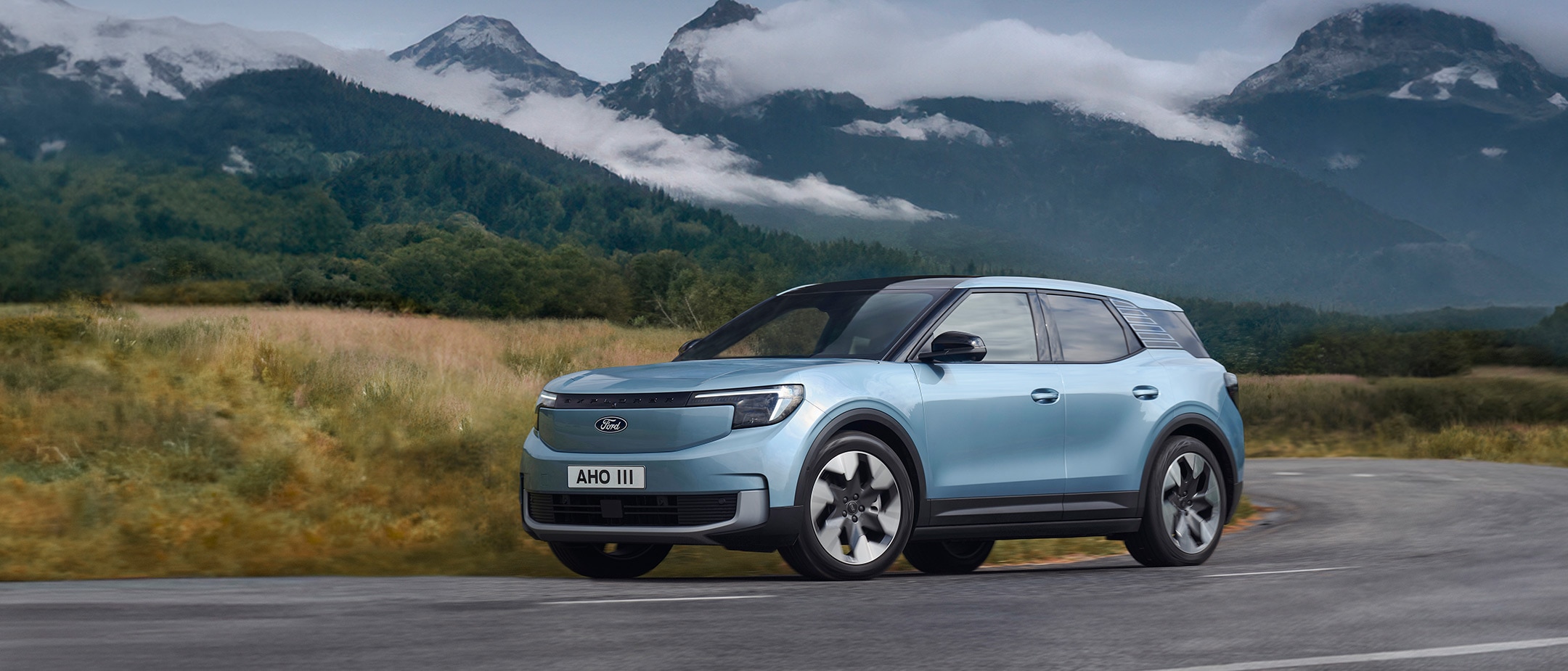 The New All-Electric Explorer being driven through wild landscape